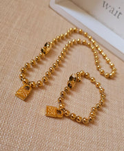 Load image into Gallery viewer, UN- Small Beads Golden Lock Set