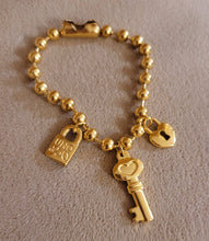 Load image into Gallery viewer, UN- Love Lock Gold Charms Bracelet
