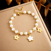 Load image into Gallery viewer, Pearl and Gold Bracelets
