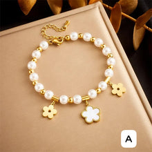 Load image into Gallery viewer, Pearl and Gold Bracelets
