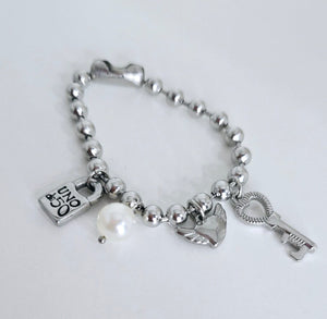 UN- Small White Charms Bracelet