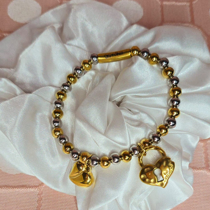 UN- Silver and Gold Bracelet