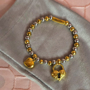 UN- Silver and Gold Bracelet